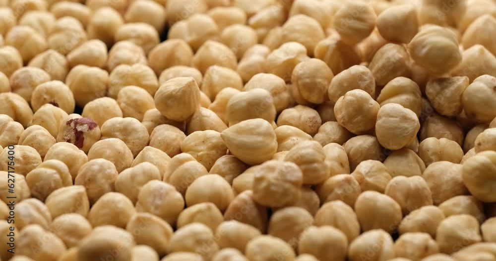 Whole shelled hazelnuts nuts kernels falling close-up Whole shelled hazelnuts nuts kernels falling close-up