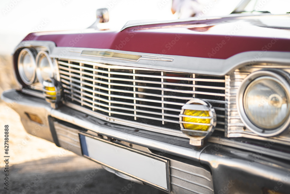 close-up of a retro car with front headlights