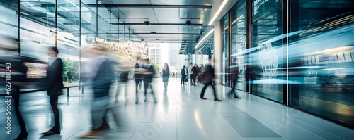 Crowd of blurred People Walking in a modern entrance. blurred business people
