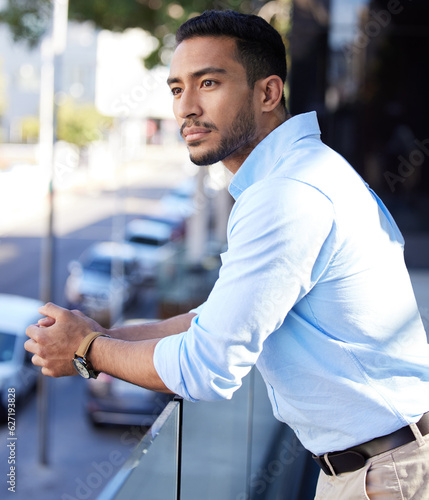 Photography Thinking, vision and a business man on the balcony of his office looking at the city for inspiration