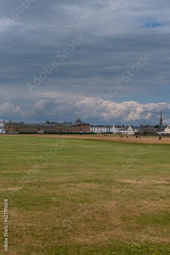 Looking into the town of Ayr from the South Promenade showing the county municipal buildings and the town hall spier in the far distance.
