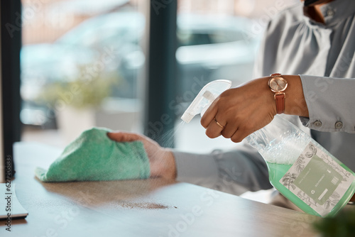Картината върху платно Hands, cleaning and product on a wooden table for hygiene, disinfection or to sanitize a surface in a home