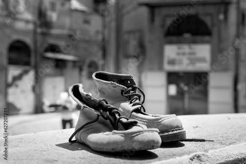 Old shabby shoes with laces photo