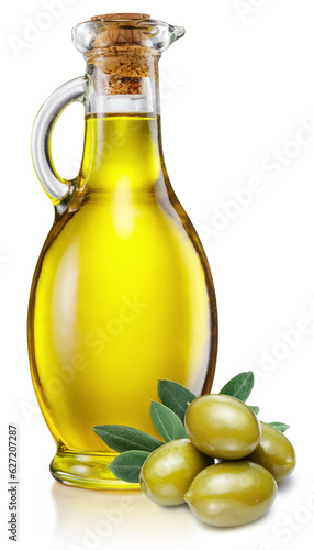 Bottle of olive oil and green olives with leaves on white background. Close-up.