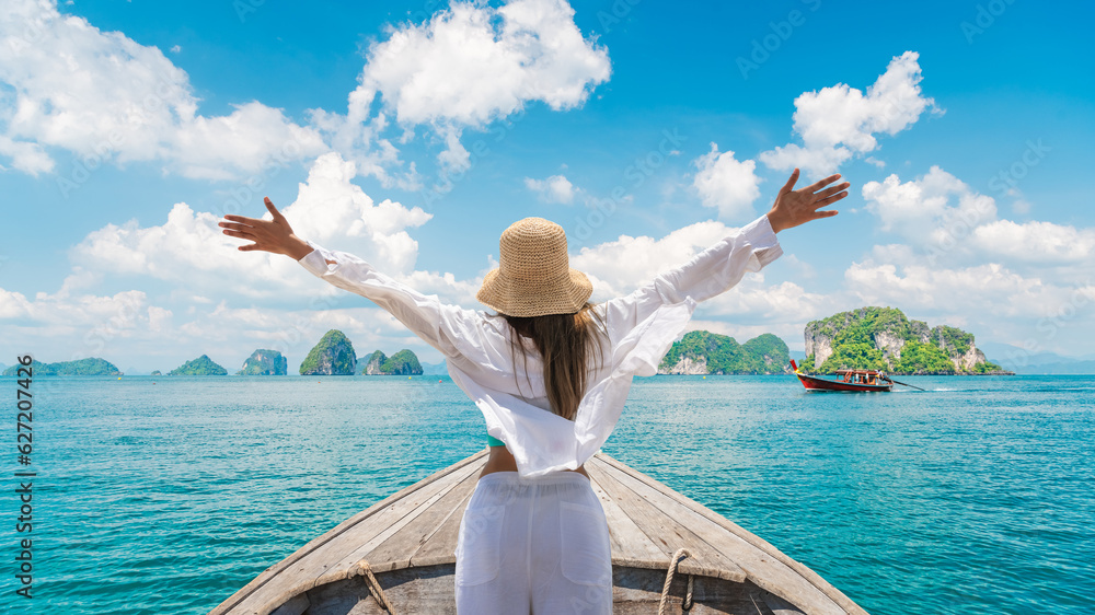 Happy traveler woman on boat joy fun nature panoramic view group of small island Andaman sea Krabi, Freedom adventure travel Phuket Thailand summer holiday vacation trips, Tourism destination Asia