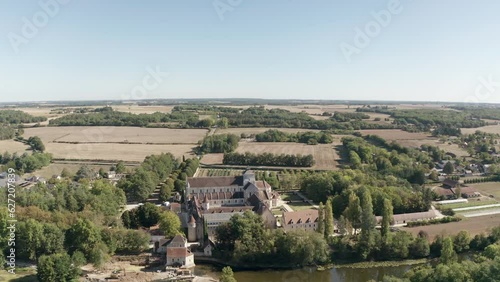 Aerial drone point of view of the beautiful Abbaye de Fontgombault or Abbey of Notre-Dame. Built in Romanesque style, it was founded in 1091 before being dissolved in 1791. It was refounded in 1948. photo