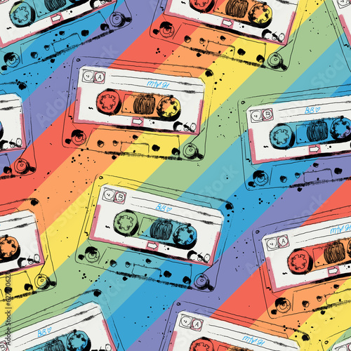 Seamless pattern with cassettes with your favorite music and a rainbow on the background