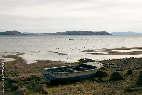 Activity of fishermen and their boats in the Llachón peninsula on Lake Titicaca.