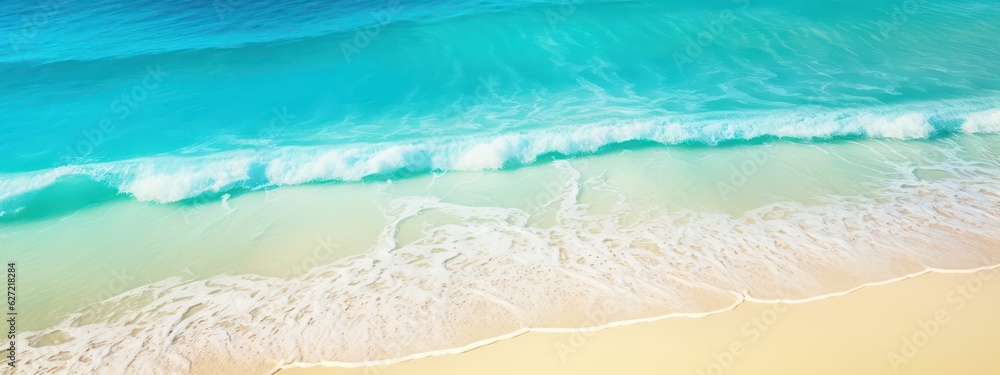 Natural textured summer background for vacation. White golden sand on the beach and turquoise water of the ocean sea with the incoming wave, copy space