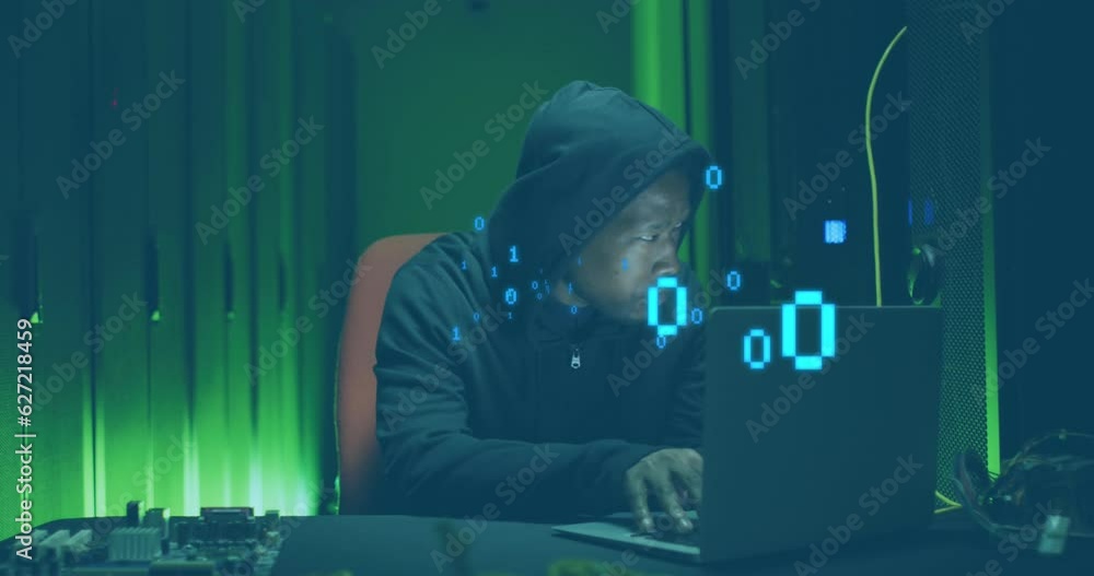 Animation of binary coding against african american male hacker using laptop at computer server room
