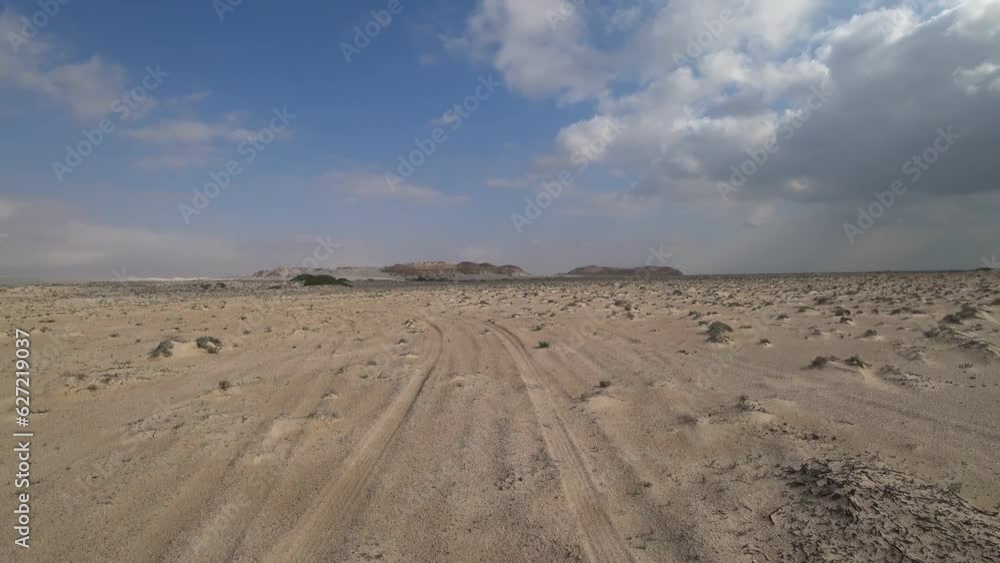 Offroad drive through the desert. Sandy desert in Oman Sultanate Offroad drive through the desert. Sandy desert in Oman Sultanate