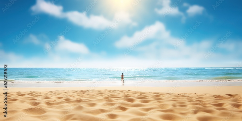 Summer background, nature of tropical golden beach with rays of sun light. Golden sand beach, sea water against blue sky with white clouds. Copy space, summer vacation concept Summer background, nature of tropical golden beach with rays of sun light. Golden sand beach, sea water against blue sky with white clouds. Copy space, summer vacation concept