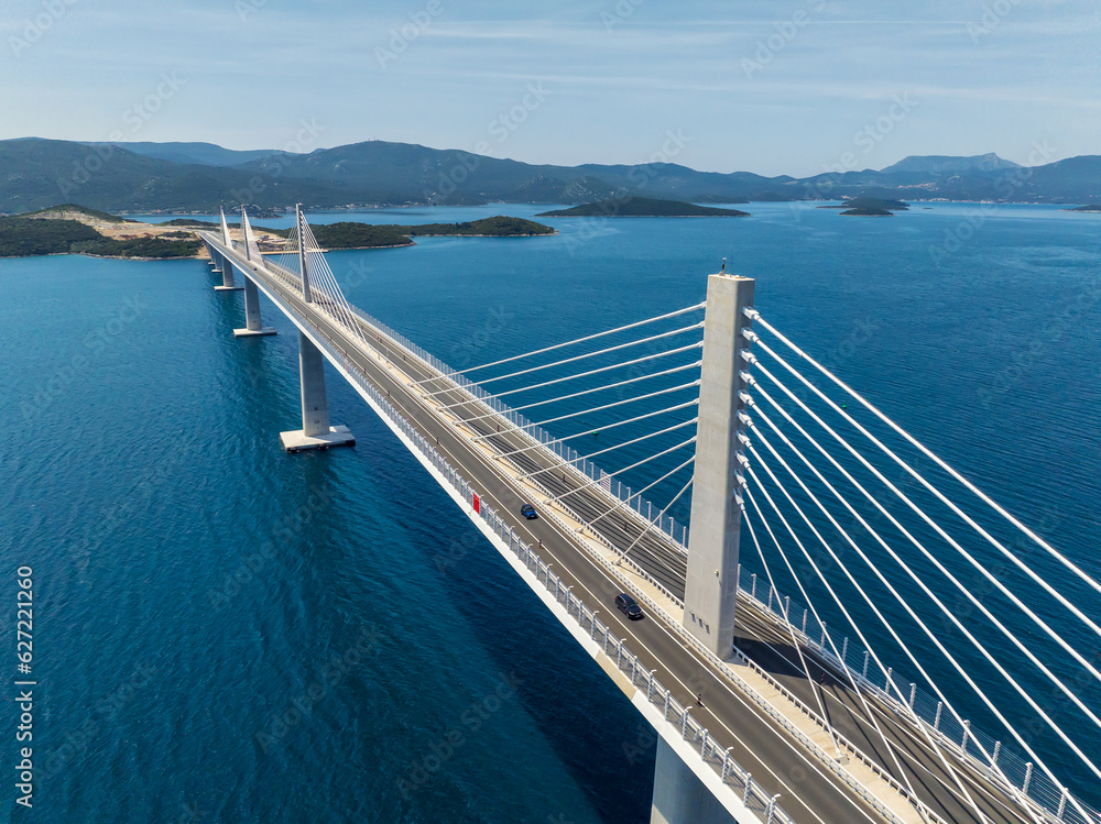 Amazing aerial view of the Peljesac bridge, which connects the mainland with the peninsula, near Ston in Croatia