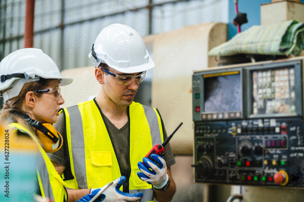 Fototapeta premium professional technician engineer working to control electrical power and safety service system, electrician working to maintenance and checking industrial equipment in term of factory technology