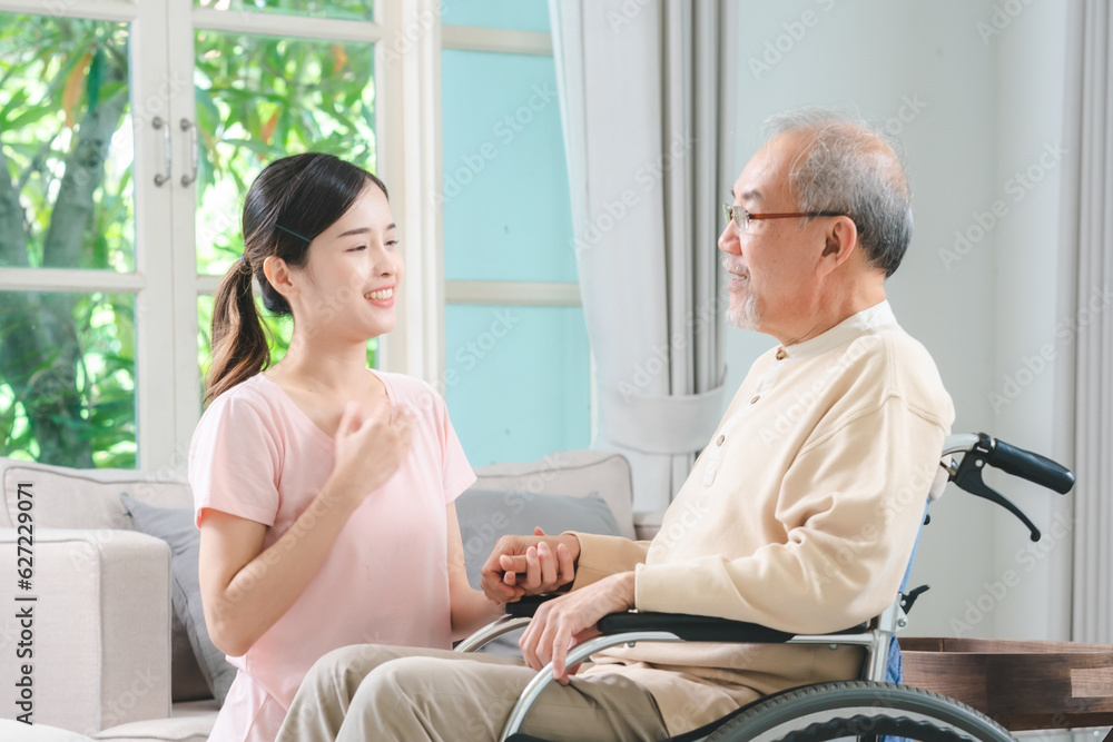 Asian family health care and insurance business at home concept, woman daughter take care support to senior elderly father patient in wheelchair together, dad having smile in happy love lifestyle Asian family health care and insurance business at home concept, woman daughter take care support to senior elderly father patient in wheelchair together, dad having smile in happy love lifestyle