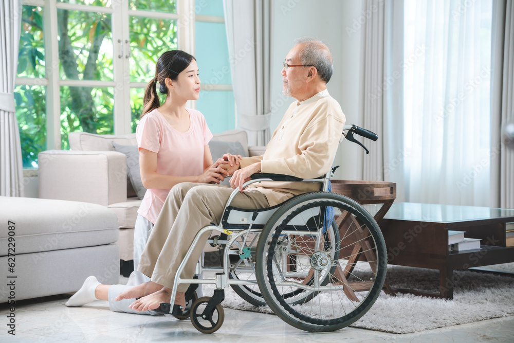 Asian family health care and insurance business at home concept, woman daughter take care support to senior elderly father patient in wheelchair together, dad having smile in happy love lifestyle Asian family health care and insurance business at home concept, woman daughter take care support to senior elderly father patient in wheelchair together, dad having smile in happy love lifestyle