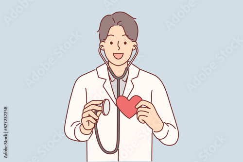 Man cardio surgeon holding stethoscope and heart offering to undergo examination