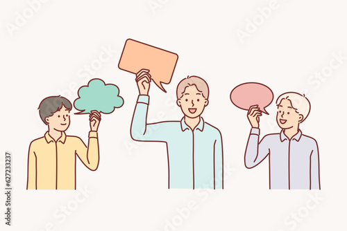 Teenage boys are holding speech bubbles symbolizing communication or children imagination