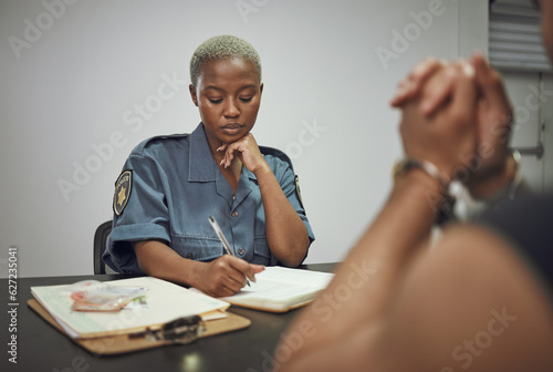 Принти на полотні Security, criminal and female police officer at the station writing a legal report for social justice