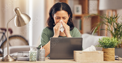 Remote work from home, sneeze and woman with a laptop, virus and illness with disease. Female person, freelancer and entrepreneur blowing her nose, covid and flu with online consultation with doctor photo
