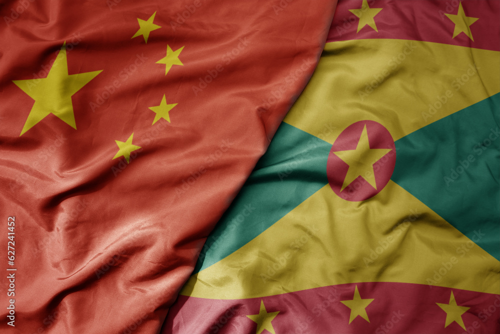 big waving national colorful flag of china and national flag of grenada . big waving national colorful flag of china and national flag of grenada .