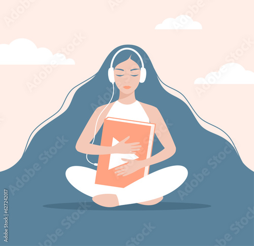Young woman in headphones sitting in lotus position on a cloudy background and holding a big book. Woman listening to an audiobook. Flat vector illustration