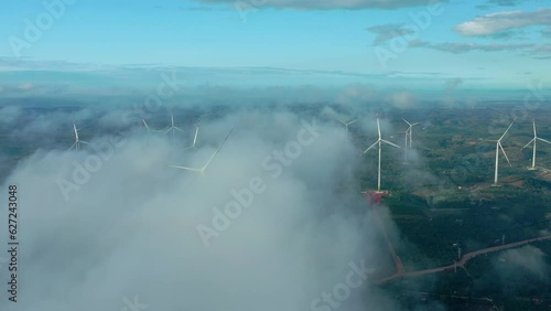Drone view wind power farm covered by cloud in early morning - Eahleo, Dak Lak, Central highlands Vietnam photo
