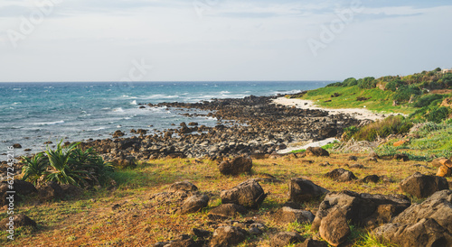 image of clear blue beach next to the island