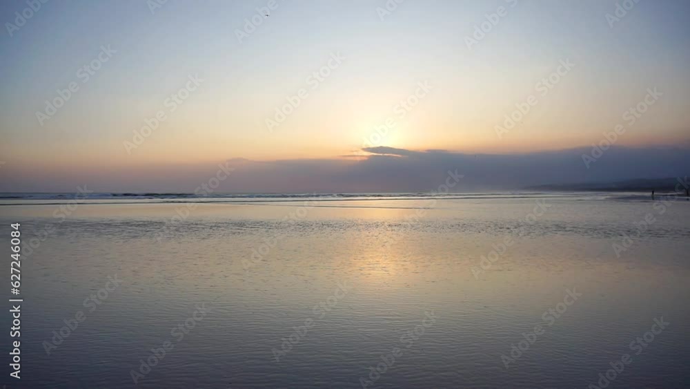 beautiful sunset view on the sea with small waves, beautiful natural panorama in the afternoon at Cijeruk Sancang Garut beach beautiful sunset view on the sea with small waves, beautiful natural panorama in the afternoon at Cijeruk Sancang Garut beach