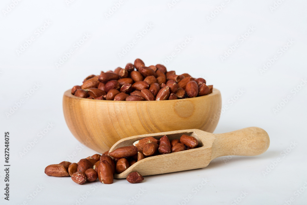 Fresh healthy peanuts in bowl on colored table background. Top view Healthy eating bertholletia concept. Super foods Fresh healthy peanuts in bowl on colored table background. Top view Healthy eating bertholletia concept. Super foods