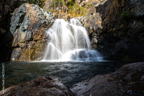 panorama of jourama falls in paluma range national park, north queensland, australia; cascade of numerous powerfull tropical waterfalls near townsville and ingham