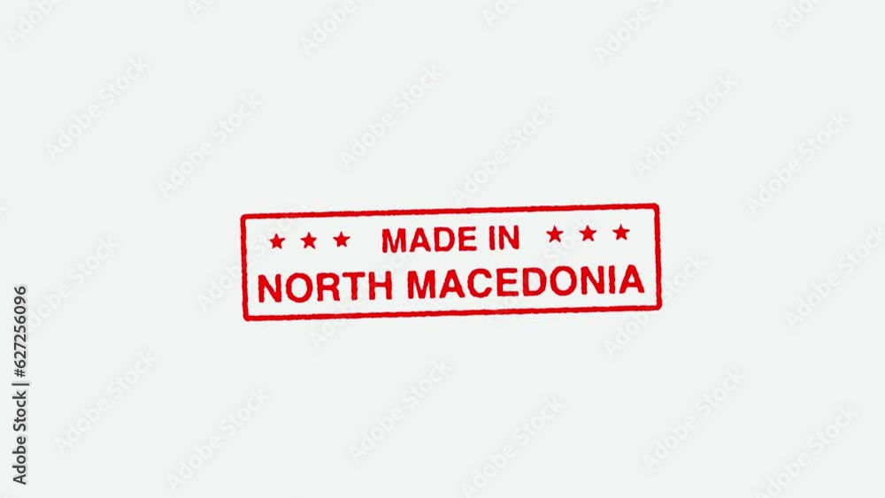 Close Up Real Hand Stamping Made in North Macedonia Stamp on White Background Close Up Real Hand Stamping Made in North Macedonia Stamp on White Background