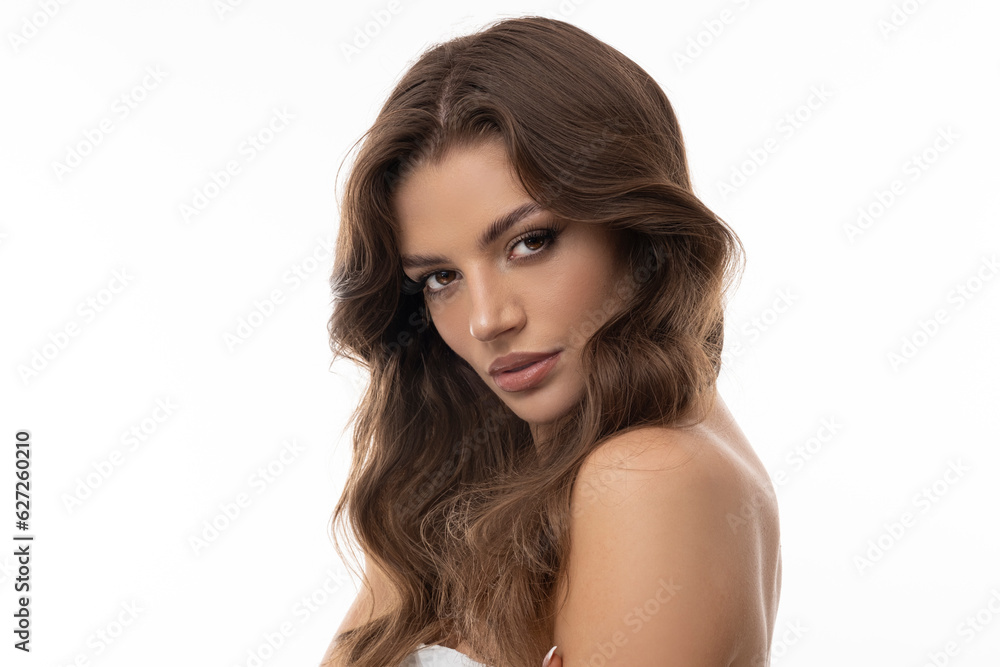 Portrait of beautiful brunette with big eyes and wavy long hair on isolated white background Portrait of beautiful brunette with big eyes and wavy long hair on isolated white background