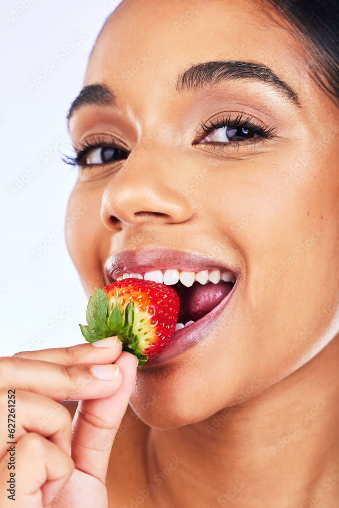 Portrait, strawberry and Indian woman in studio for health, diet and detox, nutrition and wellness. Fruit, berry and face of lady with natural, vegan or organic snack for weight loss and antioxidants Portrait, strawberry and Indian woman in studio for health, diet and detox, nutrition and wellness. Fruit, berry and face of lady with natural, vegan or organic snack for weight loss and antioxidants