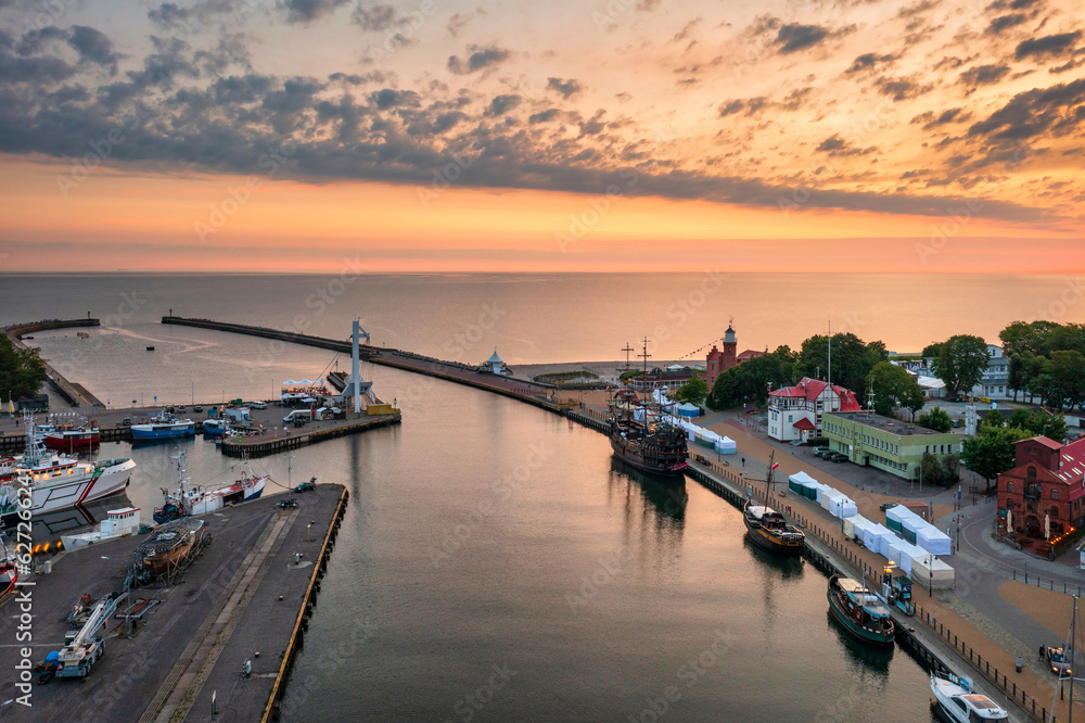 Beautiful sunrise over the Ustka town by the Baltic Sea, Poland.