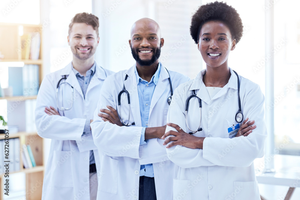 Doctors, team and arms crossed with health, diversity and cardiology, surgeon group collaboration in portrait. Confident, solidarity in cardiovascular healthcare and professional people in medicine Doctors, team and arms crossed with health, diversity and cardiology, surgeon group collaboration in portrait. Confident, solidarity in cardiovascular healthcare and professional people in medicine