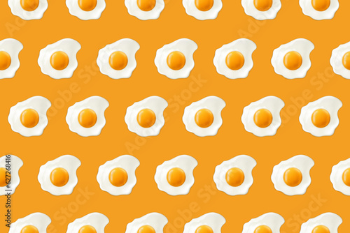 Fried eggs on a yellow background. Seamless pattern with scrambled eggs. Vector illustration of eggs. Realistic image.