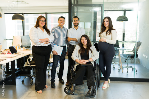 Group of multiracial businesspeople with a disabled manager © AntonioDiaz