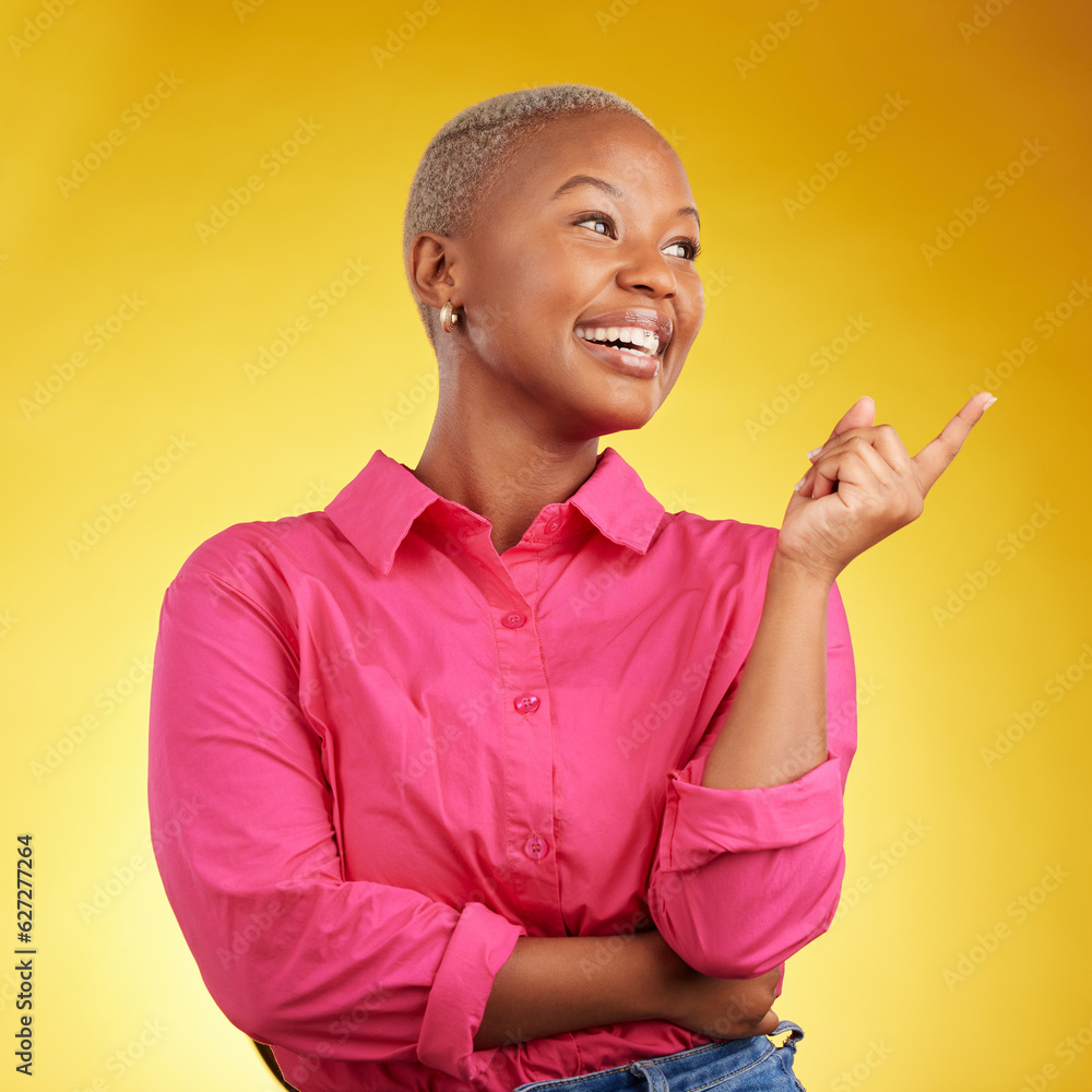 Φωτογραφία Smile, black woman and hand pointing in studio for news, deal or coming soon announcement on yellow background