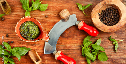 Homemade pesto sauce and ingredients.