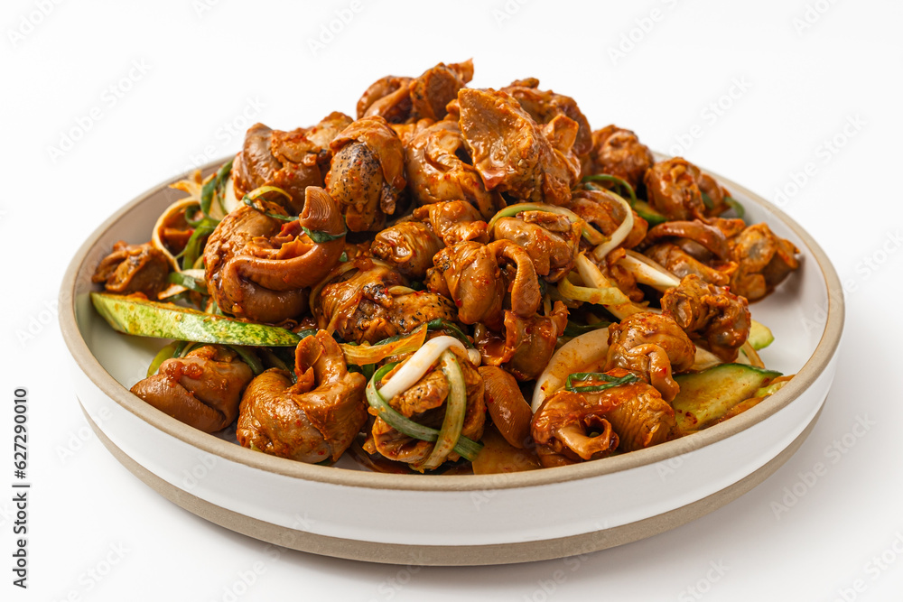 Whelk and vegetable seasoning on a white background Whelk and vegetable seasoning on a white background