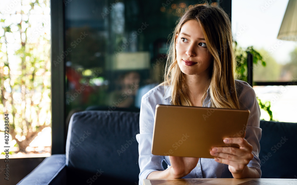 Beautiful success woman working, using digital tablet. Business, freelancer, social media concept. Beautiful success woman working, using digital tablet. Business, freelancer, social media concept.