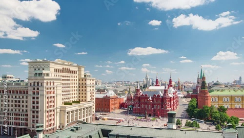 View of Manezh Square, Hotel Moscow, historical Museum and Kremlin aerial timelapse at cloudy summer day from rooftop in Moscow, Russia.