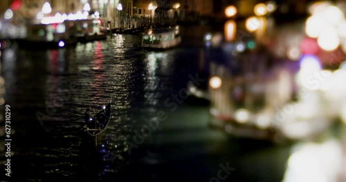 Grand Canal traffic by night in Venice Italy