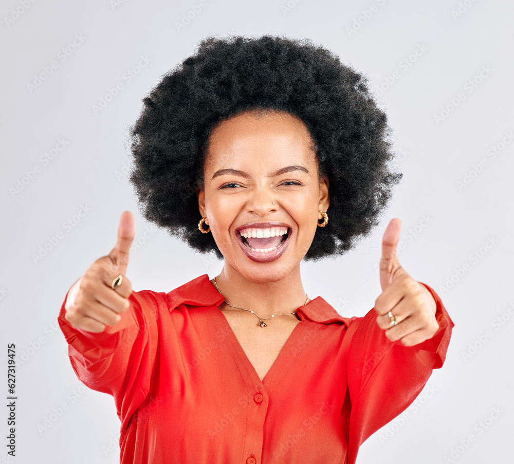 Thumbs up, happy and portrait of a businesswoman in studio with success, achievement or goal. Happiness, smile and professional African female person with an agreement hand gesture by gray background Thumbs up, happy and portrait of a businesswoman in studio with success, achievement or goal. Happiness, smile and professional African female person with an agreement hand gesture by gray background