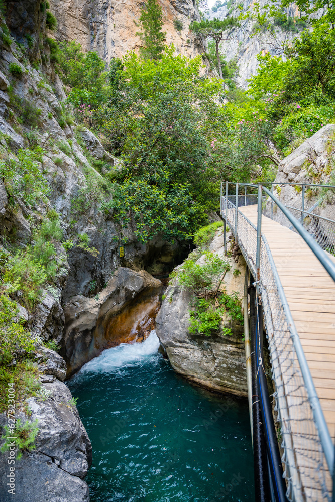 Sapadere canyon with wooden paths and cascades of waterfalls in the Taurus mountains near Alanya, Turkey Sapadere canyon with wooden paths and cascades of waterfalls in the Taurus mountains near Alanya, Turkey