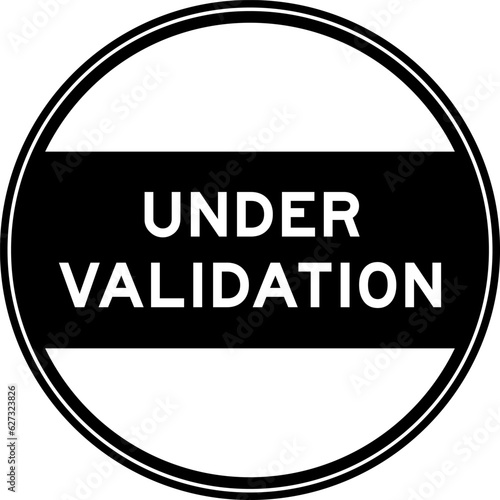 Black color round seal sticker in word under validation on white background