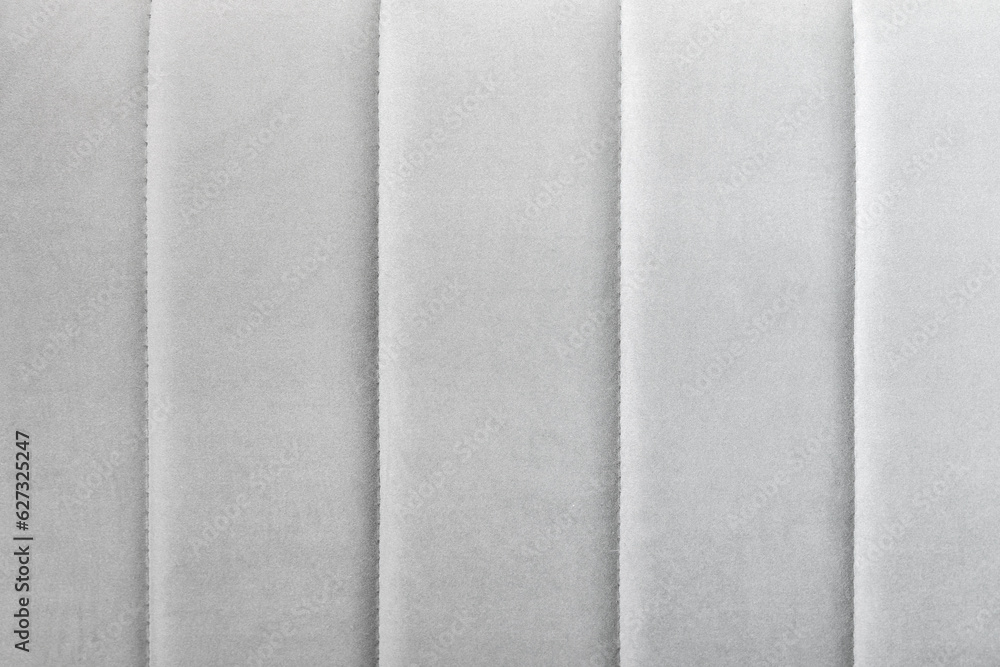 Fototapeta premium White flocking fabric, sofa back, close up photo