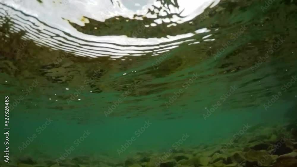 cloudy day, without sunshine, summer, on the surface and under the surface of the Adriatic sea, slow motion cloudy day, without sunshine, summer, on the surface and under the surface of the Adriatic sea, slow motion