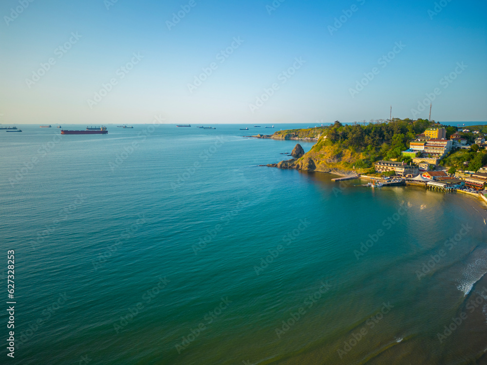 Kumkoy beach aerial view at Black Sea near historic town center Kumkoy, Sariyer district of Istanbul, Turkey. Kumkoy beach aerial view at Black Sea near historic town center Kumkoy, Sariyer district of Istanbul, Turkey.